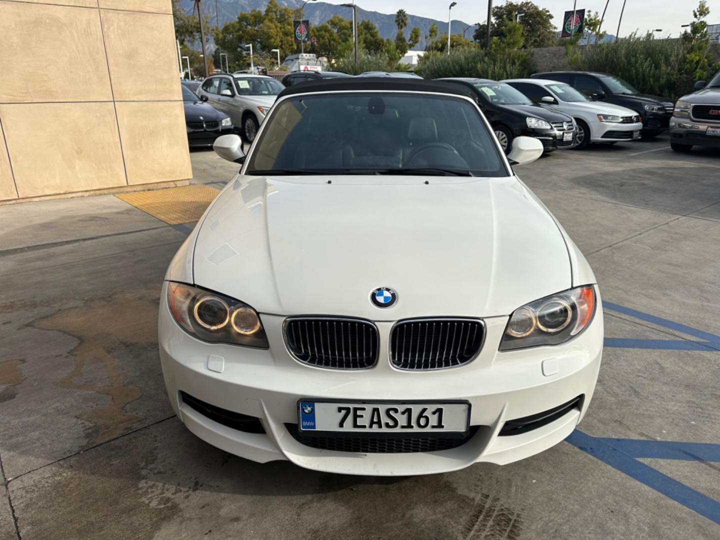 2011 WHITE /Black BMW 1-Series 135i Convertible (WBAUN7C56BV) with an 3.0L L6 DOHC 24V engine, Automatic transmission, located at 30 S. Berkeley Avenue, Pasadena, CA, 91107, (626) 248-7567, 34.145447, -118.109398 - Experience the Ultimate Driving Pleasure: 2011 BMW 135i Convertible Now Available in Pasadena, CA Discover the thrill of open-air driving with the 2011 BMW 135i Convertible, a perfect blend of luxury and performance, now featured at our BHPH dealership in Pasadena, CA. This exquisite convertible - Photo#7